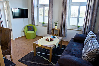 Wohnzimmer der Ferienwohnung in Burg Fehmarn